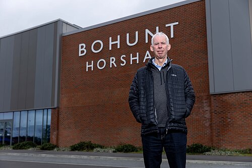 Cllr John Milne outside Bohunt Academy, Horsham