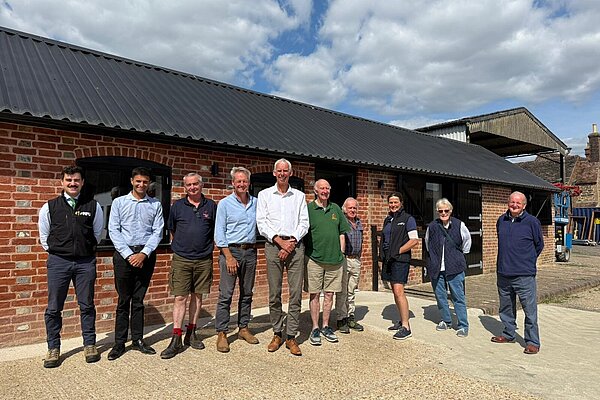 John Milne with farmers
