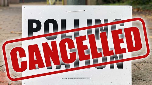Cancelled polling station sign
