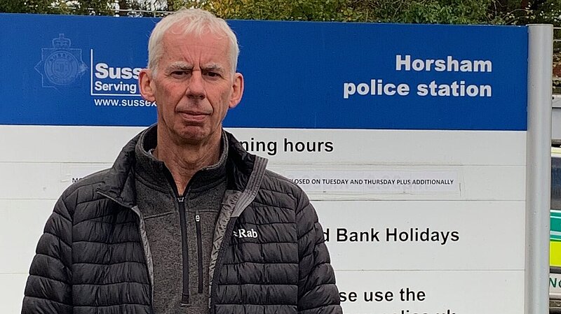 John Milne outside Horsham Police Station